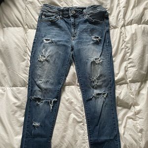 women’s blue ripped jeans